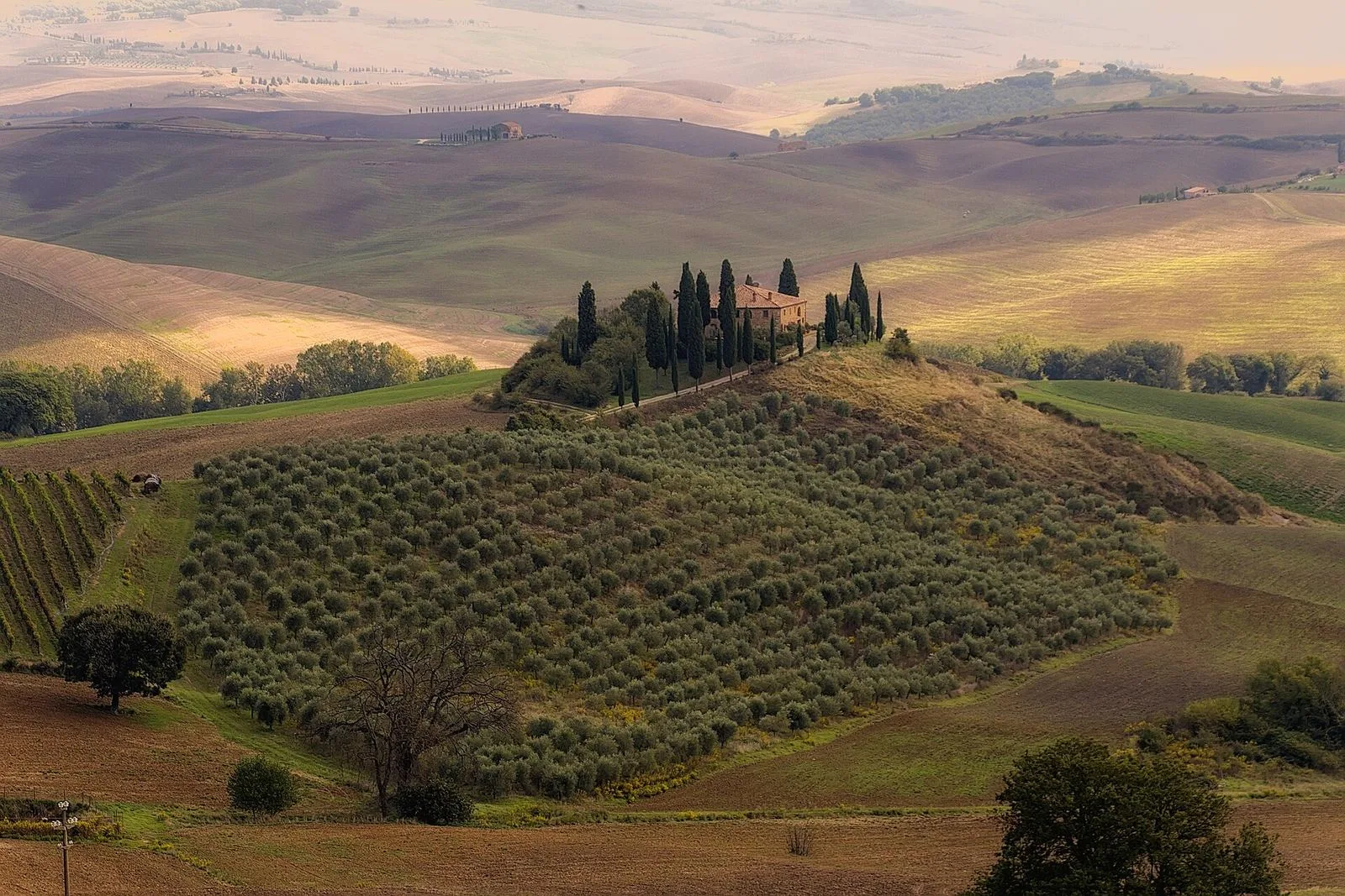 Kamenný statek s výhledem na Val d'Orcia